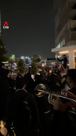 Mexico fans 'serenade' England team outside hotel ahead of World Cup match