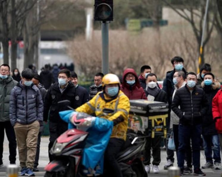 Deaths, self-immolation draw scrutiny on China tech giants