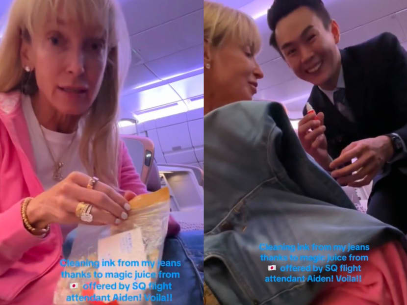 TikTok user Paige Parker with SIA flight attendant "Aiden" who helped the passenger with a product to remove a stain from her jeans.