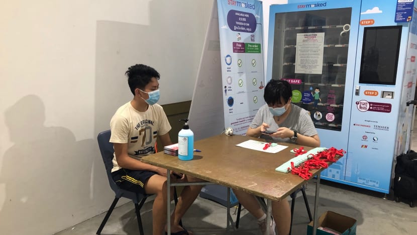 Residents should collect TraceTogether tokens near their homes, says Vivian Balakrishnan, amid rush at some CCs