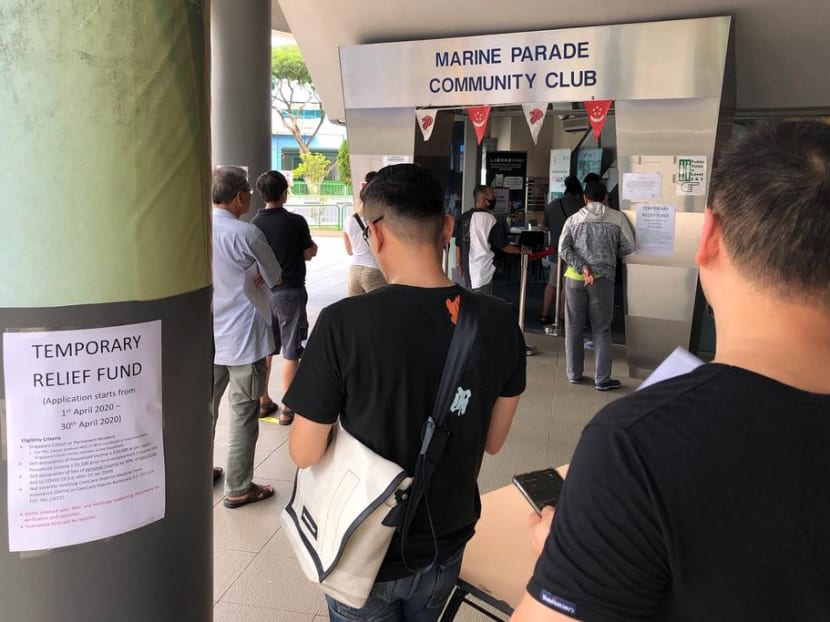 Applicants queuing to apply for the Temporary Relief Fund at Marine Parade Community Club on April 1, 2020.