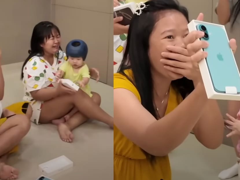 M&rsquo;sian couple surprises 2 domestic helpers with iPhone 16s