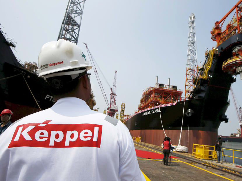 A worker passes a floating production, storage and offloading (FPSO) vessel modified and upgraded by Keppel Shipyard for Malaysia-based Bumi Armada in their shipyard in Singapore. Reuters file photo A worker passes a floating production, storage and offloading (FPSO) vessel modified and upgraded by Keppel Shipyard for Malaysia-based Bumi Armada in their shipyard in Singapore. Reuters file photo