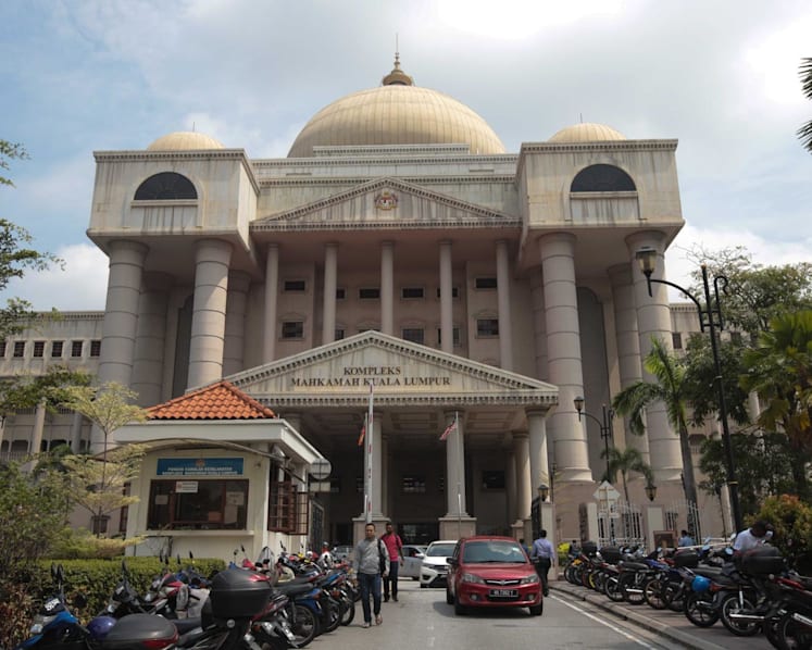 Son of former Malaysian minister denies being detained at Changi Airport