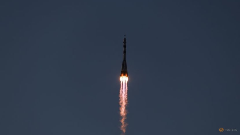 Russia sends American and two cosmonauts to space station with rare NASA chief visit