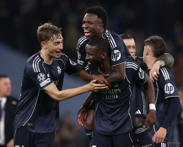 Vinicius Jr nets double as Real Madrid dispatch Man City in Champions League last 16