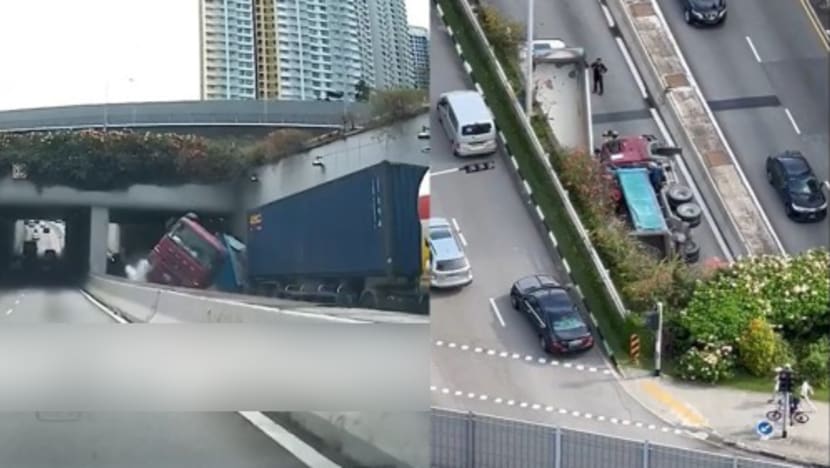 Container truck tips over along Clementi Ave 6, causing road to be closed for almost 8 hours