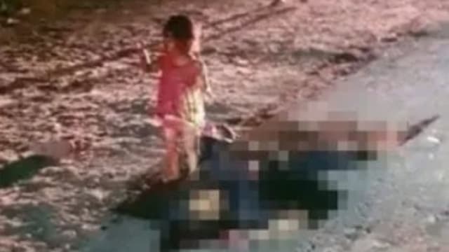 马国母亲被劫杀倒卧血泊中 一岁女伴尸大哭