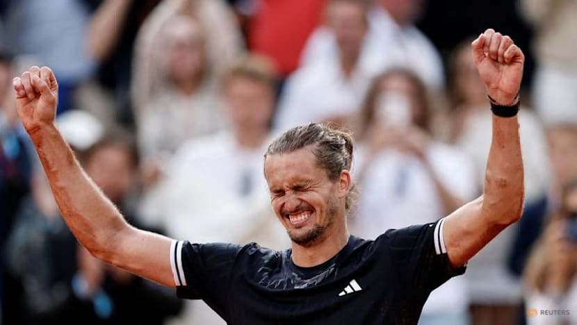 Zverev tears down the wall to enter Grand Slam winners' circle at French Open