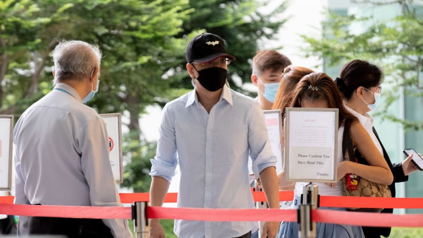 Motorist fined S$3,000 for slapping cyclist who hit his car after he overtook her on road