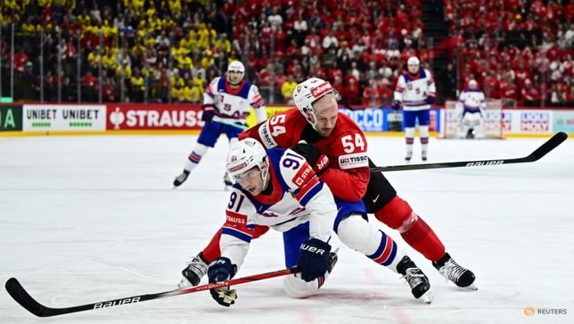 Ice hockey-Thompson ends long US wait for world championship gold