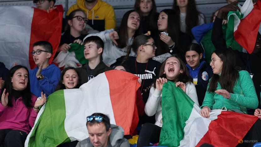 Curling-Curlers are loving the noisy fans at Winter Games