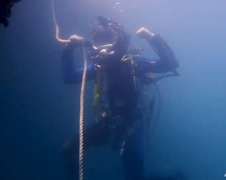 For a pay packet, they risk drowning, crocodile attacks and being hit by ships