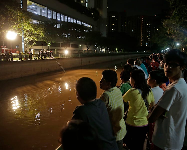2 women killed after car plunges into Singapore River