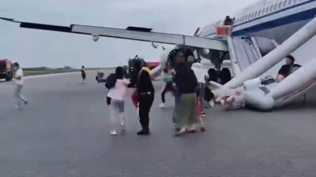 携行李逃生摔倒 国航失火客机乘客遭网批