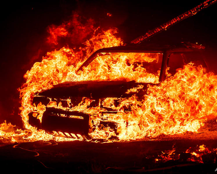 Scores of wildfires scorching swathes of the US and Canada 