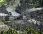 Israel destroys bridge in Lebanon, threatens Gaza-scale destruction