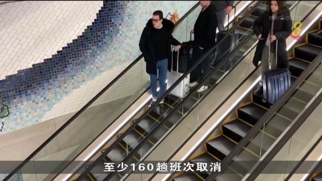 受暴风雨天气影响 美国逾100趟航班取消