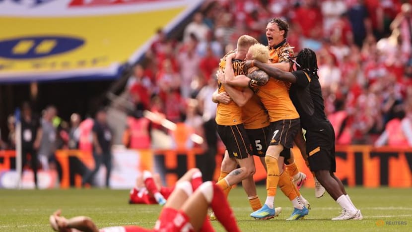 Hull back in Premier League after McBurnie's last-gasp playoff winner