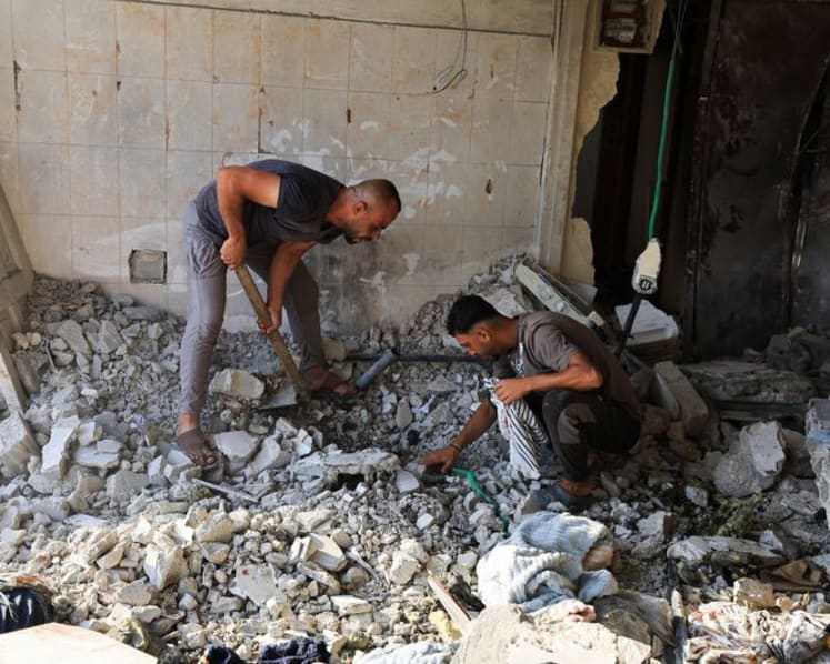 Israeli strikes kill 18 in Gaza, minister says no deal to halt attacks