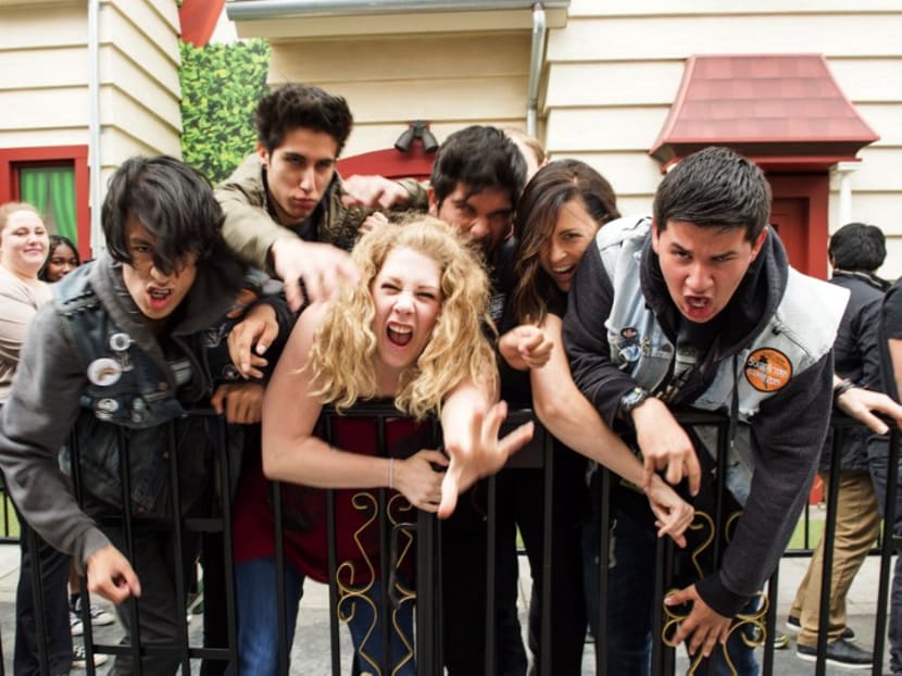 Candidates act for the camera as they wait to perform in front of a jury at The Walking Dead casting call auditions for the future Walking Dead attraction at Universal Studios Hollywood. Photo: AFP