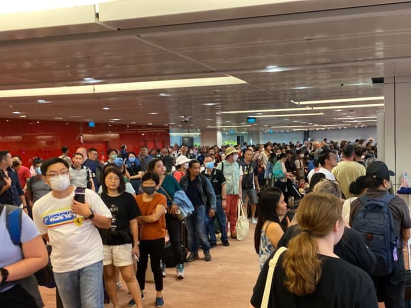 Long queues in the departure area at Changi Airport Terminal 1 on March 31, 2023. Long queues in the departure area at Changi Airport Terminal 1 on March 31, 2023.