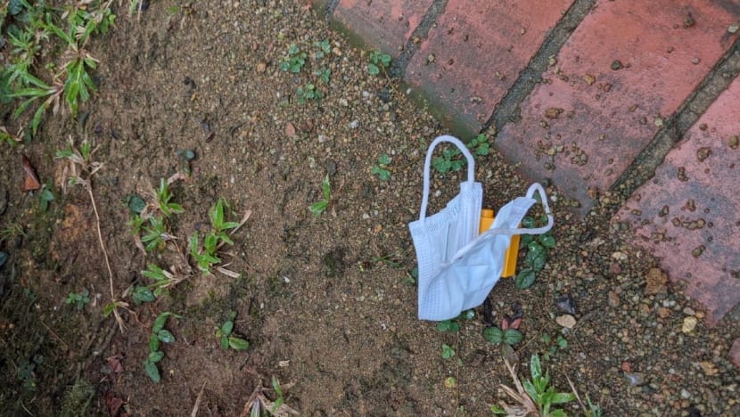 Explainer: How should face masks be properly disposed of, and can they be reused?