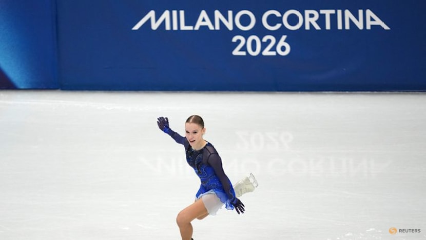 Figure Skating-Crowd lift helps Israel's Seniuk qualify for free skate