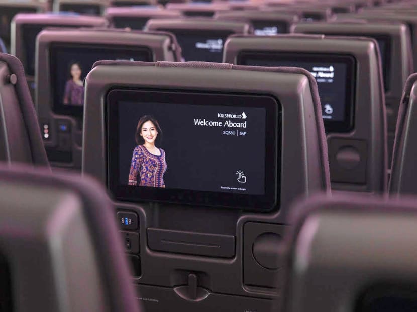 The interior of a Singapore Airlines plane. The interior of a Singapore Airlines plane.