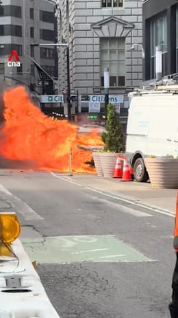 Car bursts into flames near New York City's Charging Bull statue