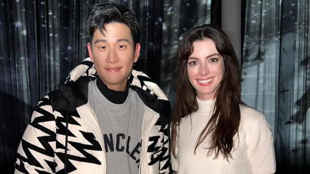 时装周遇偶像Anne Hathaway　周兴哲秒变“迷弟”