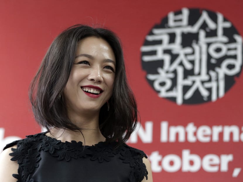 Chinese actress Tang Wei smiles before a press conference during the Busan International Film Festival in Busan, South Korea, Saturday, Oct. 3, 2015. Photo: AP