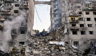 Russian strikes kill 14 in 'horrific' attack on Kyiv