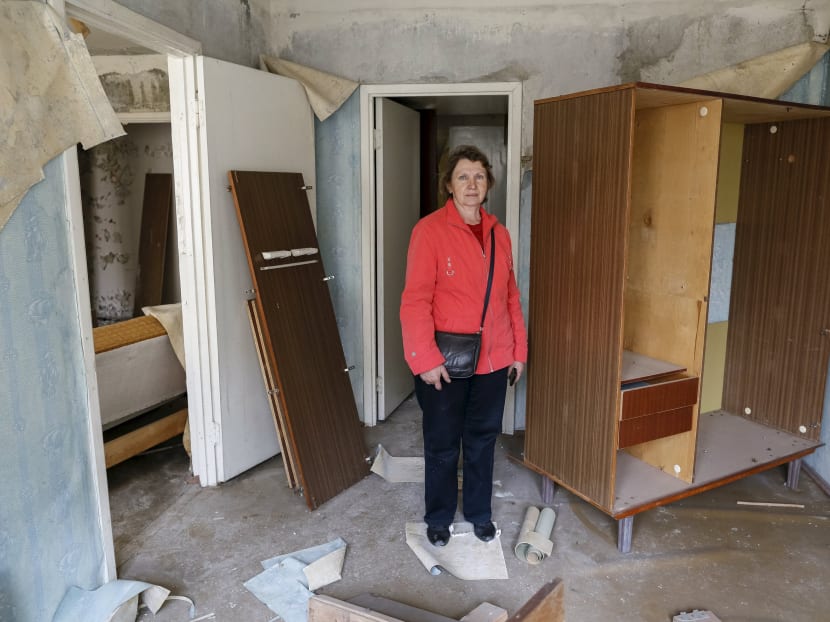 Gallery: Former Chernobyl residents take a bittersweet visit home