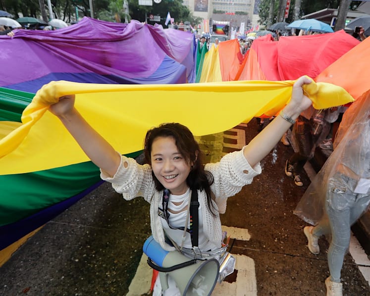 Tens of thousands brave rain at east Asia's largest Pride march in Taiwan