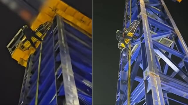 工人起重机上突感不适 民防人员高空施救