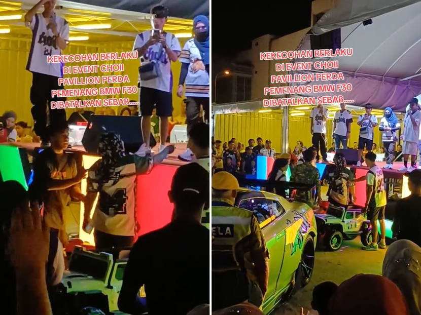 A woman in Malaysia caused a ruckus after the BMW car she won in a lucky draw was forfeited because she failed to turn up onstage.