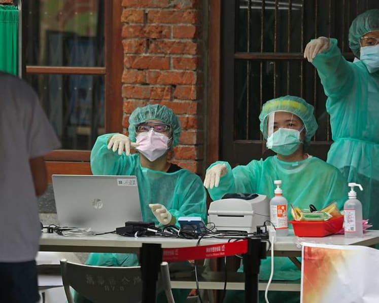 Taiwan struggles with COVID-19 testing backlog amid largest outbreak