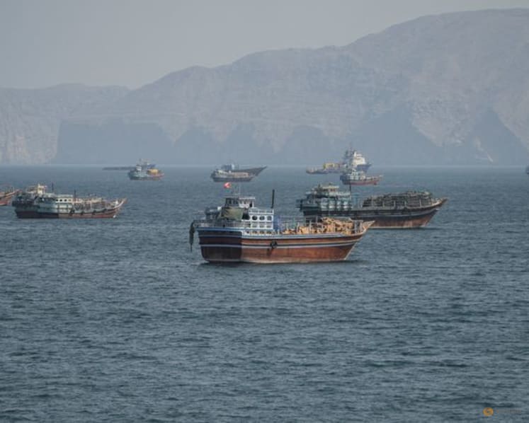 Two Singapore-registered vessels struck in Strait of Hormuz, one sinks