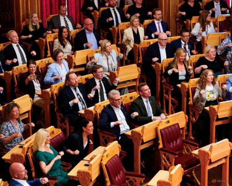 Norwegian parliament gets behind World Cup team with fans' Viking rowing display