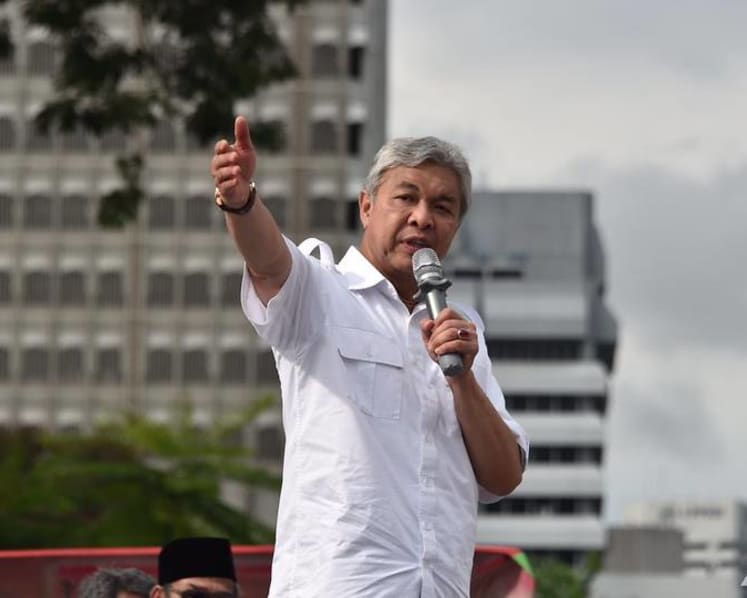 UMNO, PAS leaders pledge unity at KL white shirts rally 