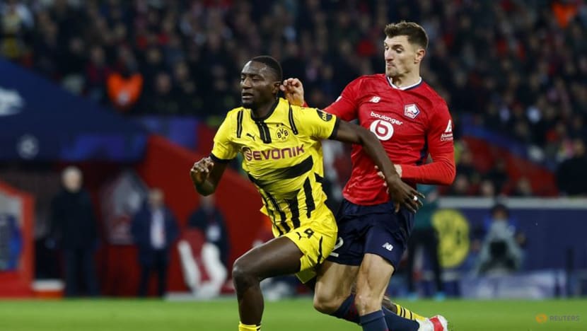 Second-half comeback sends Dortmund into Champions League quarters again