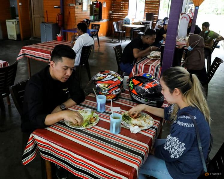 Malaysia's new COVID-19 cases remain above 20,000 for fourth straight day