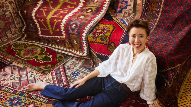 This passionate collector of vintage tribal rugs uses them to style her home in Singapore