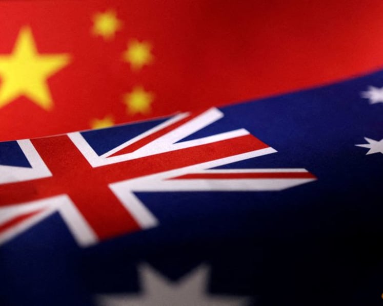 Australia warns against foreign interference after Chinese woman charged over monitoring Buddhist group