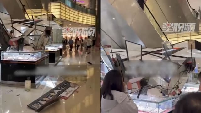 中国男子翻越商场电动扶梯 坠楼身亡 