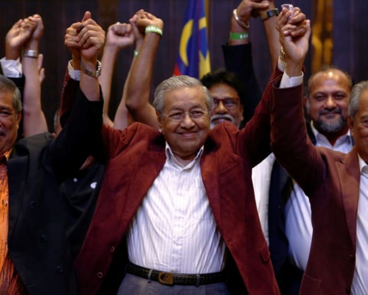 BN out, as opposition pulls off shock Malaysian GE win