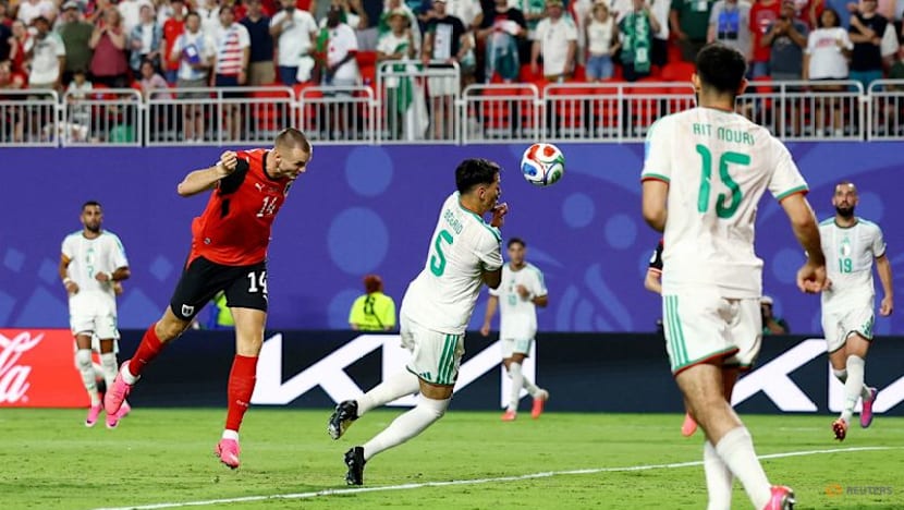 Austria draw with Algeria in World Cup thriller to progress and send Iran home