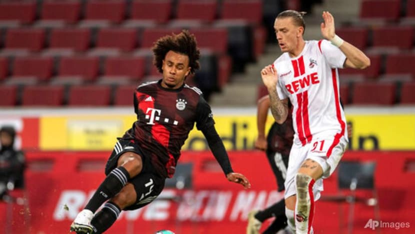 Football: Bayern labors under busy schedule but goes top in Bundesliga