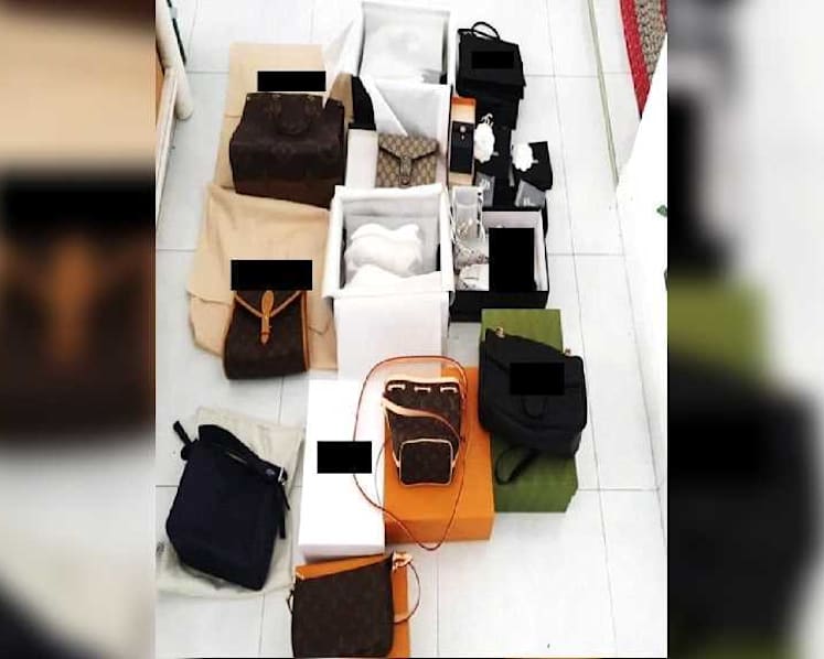 Man arrested over alleged sale of counterfeit luxury goods on Carousell